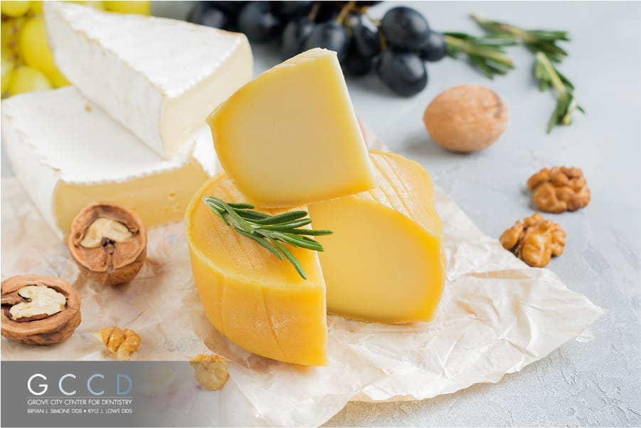 Cheddar and Swiss cheese slices arranged neatly